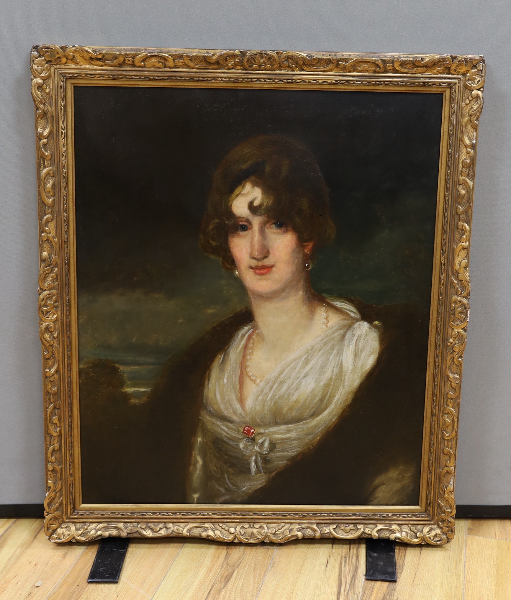 19th century English School, oil on canvas, Half length portrait of a lady, 71 x 59cm